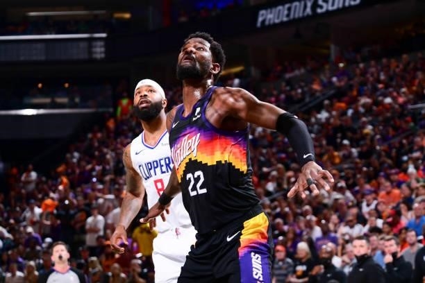 Marcus Morris Sr. #8 of the LA Clippers and Deandre Ayton of the Phoenix Suns fight for position during the game during Game 1 of the Western...