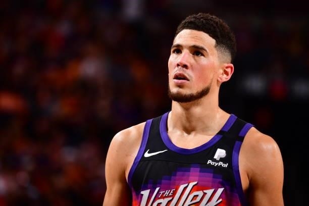 Devin Booker of the Phoenix Suns looks on during the game against the LA Clippers during Game 1 of the Western Conference Finals of the 2021 NBA...