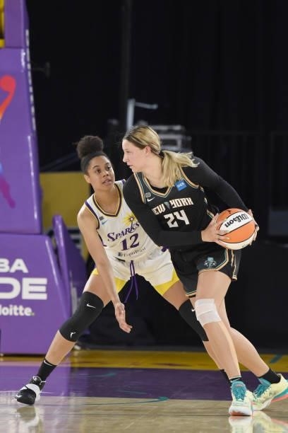 Nia Coffey of the Los Angeles Sparks plays defense on Kylee Shook of the New York Liberty on June 20, 2021 at the Los Angeles Convention Center in...