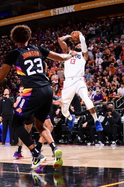 Paul George of the LA Clippers shoots the ball during the game against the Phoenix Suns during Game 1 of the Western Conference Finals of the 2021...