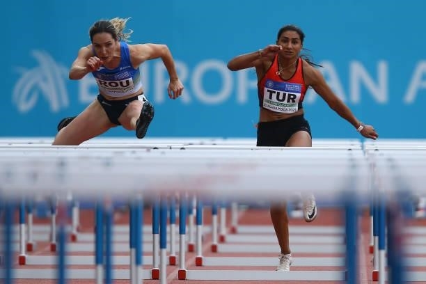 Anamaria Nesteriuc of Romania and Sevval Ayaz of Turkey compete in the Women's 100m Hurdles Final B on Day 2 at the European Athletics Team...