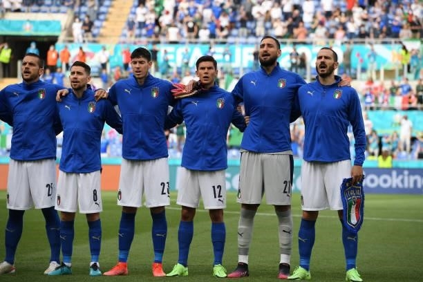 Players of Italy sing the National anthem during the UEFA Euro 2020 Championship Group A match between Italy and Wales at Olimpico Stadium on June...