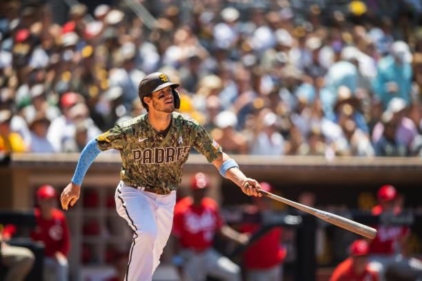 Wil Myers of the San Diego Padres hits a double in the third inning against the Cincinnati Reds on June 20, 2021 at Petco Park in San Diego,...
