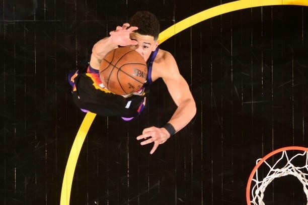 Devin Booker of the Phoenix Suns reaches for the ball during the game against the LA Clippers during Game 1 of the Western Conference Finals of the...