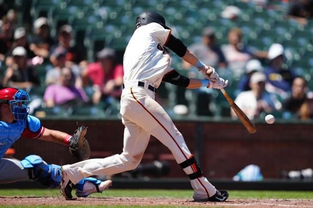 Steven Duggar of the San Francisco Giants hits an RBI double during the game between the Philadelphia Phillies and the San Francisco Giants at Oracle...