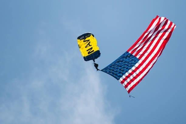 The Leap Frogs Navy Parachute Team descend into the ballpark before the San Diego Padres face against the Cincinnati Reds on June 20, 2021 at Petco...