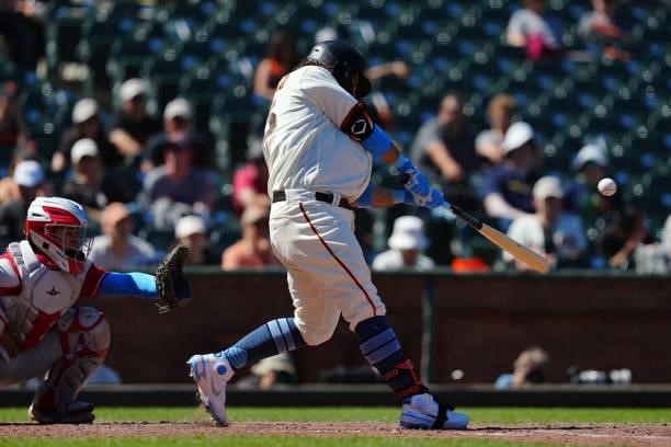Brandon Crawford of the San Francisco Giants doubles during the game between the Philadelphia Phillies and the San Francisco Giants at Oracle Park on...