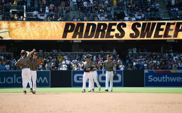 San Diego Padres players celebrate after beating the Cincinnati Reds 3-2 in a baseball game at Petco Park on June 20, 2021 in San Diego, California.