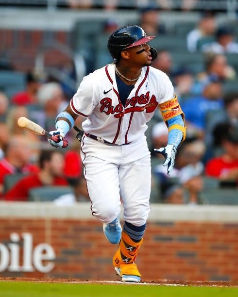 Ronald Acuna Jr. #13 of the Atlanta Braves watches the ball after hitting his 100th career home run in the third inning of game two of a doubleheader...