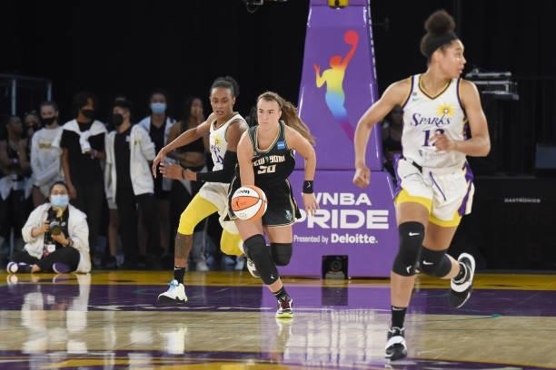 Sabrina Ionescu of the New York Liberty dribbles the ball against the Los Angeles Sparks on June 20, 2021 at the Los Angeles Convention Center in Los...