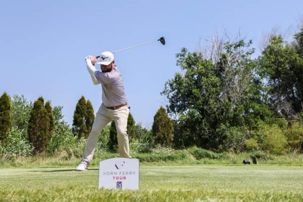 Erik Barnes plays his shot from the 18th tee during the final round of the Wichita Open Benefitting KU Wichita Pediatrics at Crestview Country Club...