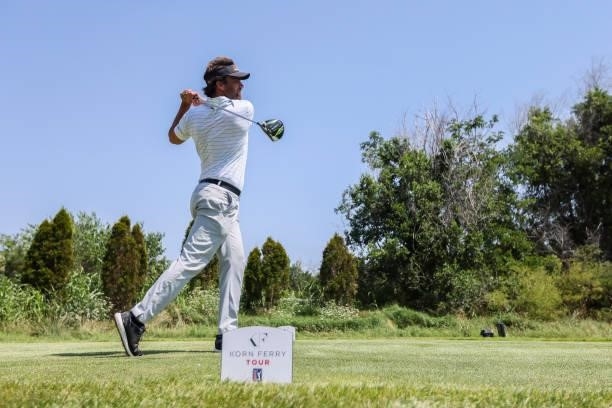 Curtis Thompson plays his shot from the 18th tee during the final round of the Wichita Open Benefitting KU Wichita Pediatrics at Crestview Country...