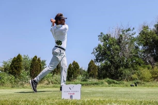 Curtis Thompson plays his shot from the 18th tee during the final round of the Wichita Open Benefitting KU Wichita Pediatrics at Crestview Country...