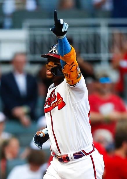 Ronald Acuna Jr. #13 of the Atlanta Braves reacts after hitting his 100th career home run in the third inning of game two of a doubleheader against...