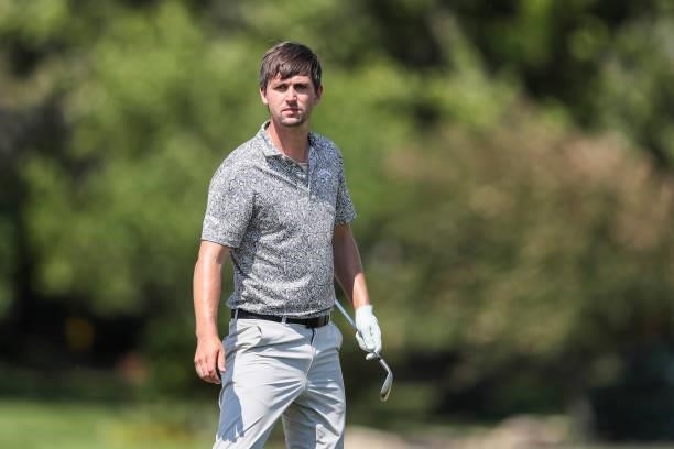 Ollie Schniederjans looks on from the 18th green during the final round of the Wichita Open Benefitting KU Wichita Pediatrics at Crestview Country...