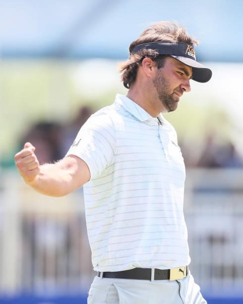 Curtis Thompson reacts after sinking his putt on the 17th green during the final round of the Wichita Open Benefitting KU Wichita Pediatrics at...