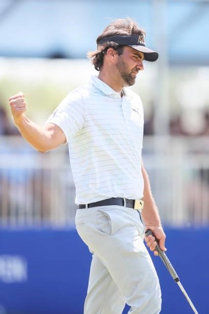 Curtis Thompson reacts after sinking his putt on the 17th green during the final round of the Wichita Open Benefitting KU Wichita Pediatrics at...