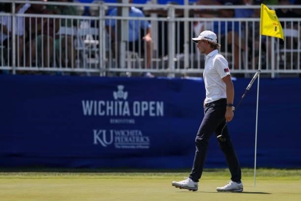 Austin Smotherman looks on from the 18th green during the final round of the Wichita Open Benefitting KU Wichita Pediatrics at Crestview Country Club...