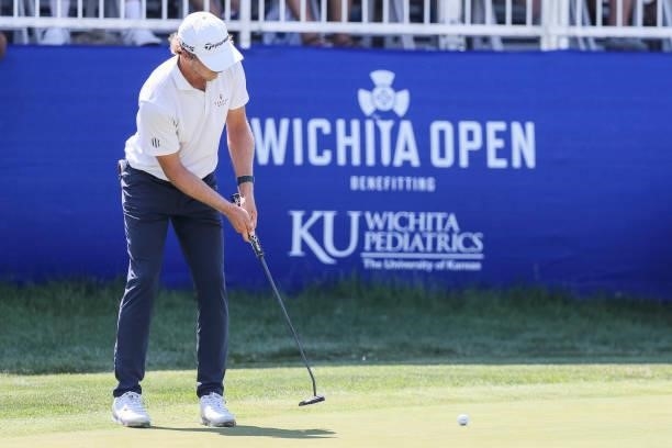 Austin Smotherman putts on the 18th green during the final round of the Wichita Open Benefitting KU Wichita Pediatrics at Crestview Country Club on...