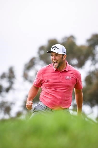 Jon Rahm of Spain celebrates with a fist pump after making a birdie putt on the 17th hole green during the final round of the 121st U.S. Open on the...