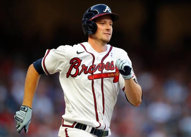 Drew Smyly of the Atlanta Braves runs to first after hitting a single in the fifth inning of game two of a doubleheader against the St. Louis...