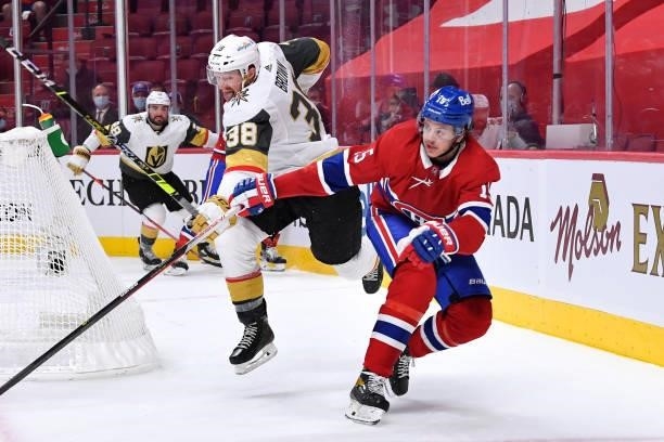 June 20: Jesperi Kotkaniemi of the Montreal Canadiens fights for the puck against Patrick Brown of the Vegas Golden Knights in Game Four of the...