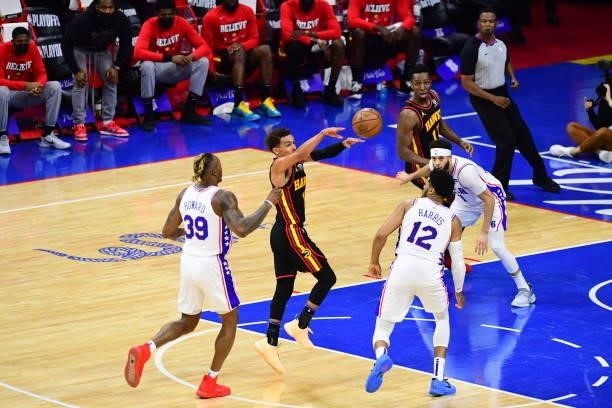 Trae Young of the Atlanta Hawks passes the ball against the Philadelphia 76ers during Round 2, Game 7 of the 2021 NBA Playoffs on June 20, 2021 at...