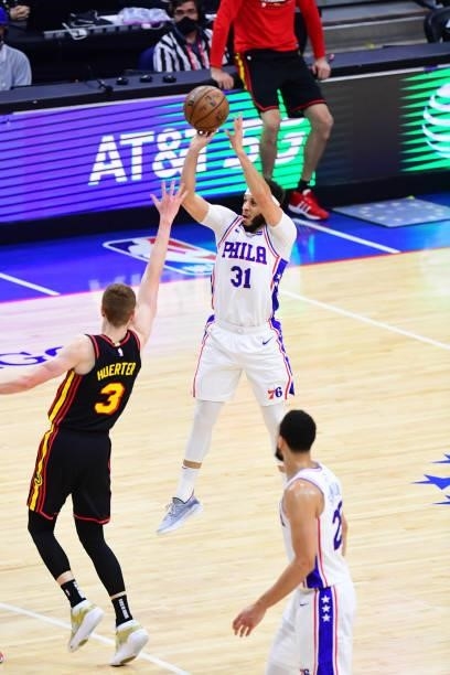 Seth Curry of the Philadelphia 76ers shoots a three point basket against the Atlanta Hawks during Round 2, Game 7 of the 2021 NBA Playoffs on June...
