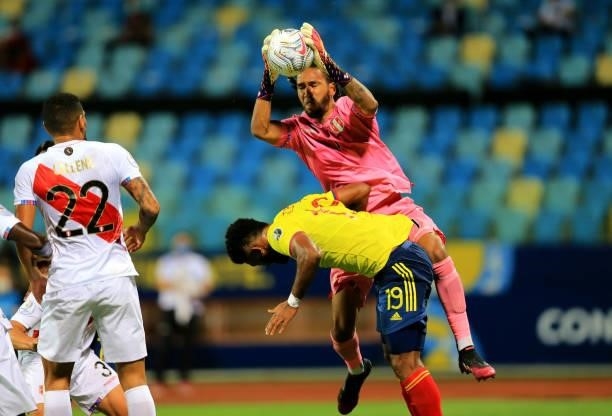 Pedro Gallese of Peru saves the ball against Miguel Borja of Colombia during the match between Colombia and Peru as part of Conmebol Copa America...