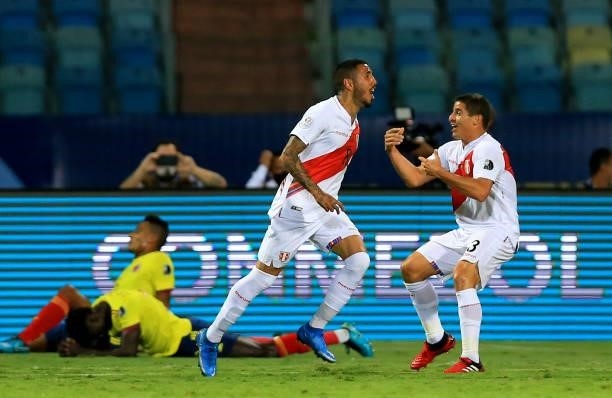 Sergio Pena of Peru celebrates after scoring a goal with teammate Aldo Corzo during the match between Colombia and Peru as part of Conmebol Copa...