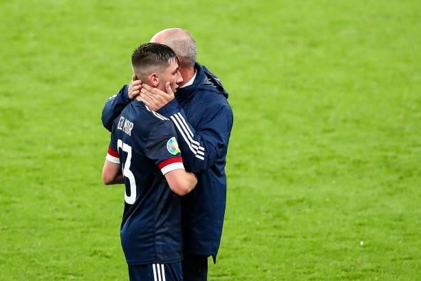 Billy Gilmour shakes hands with Steve Clarke the head coach / manager of Scotland as he is substituted off during the UEFA Euro 2020 Championship...