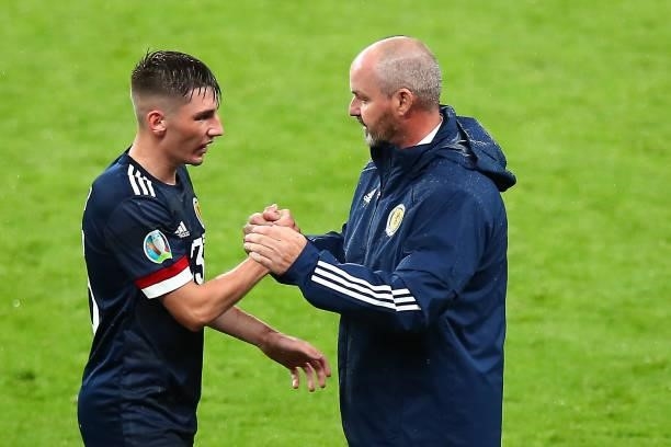 Billy Gilmour shakes hands with Steve Clarke the head coach / manager of Scotland as he is substituted off during the UEFA Euro 2020 Championship...