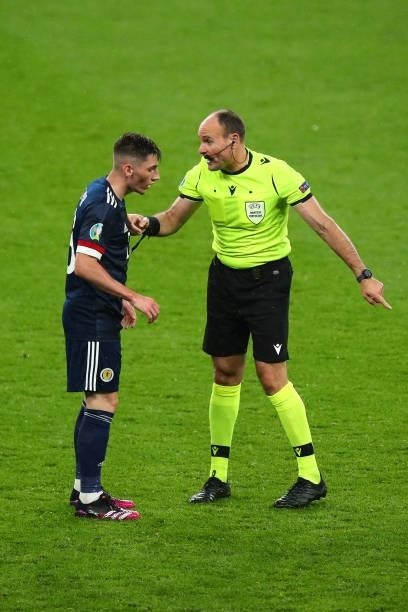 Referee Antonio Miguel Mateu Lahoz speaks to Billy Gilmour of Scotland during the UEFA Euro 2020 Championship Group D match between England and...