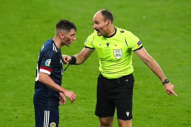 Referee Antonio Miguel Mateu Lahoz speaks to Billy Gilmour of Scotland during the UEFA Euro 2020 Championship Group D match between England and...