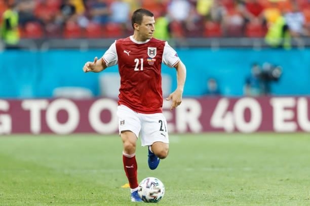 Stefan Lainer of Austria controls the ball after the UEFA Euro 2020 Championship Group C match between Ukraine and Austria at National Arena on June...