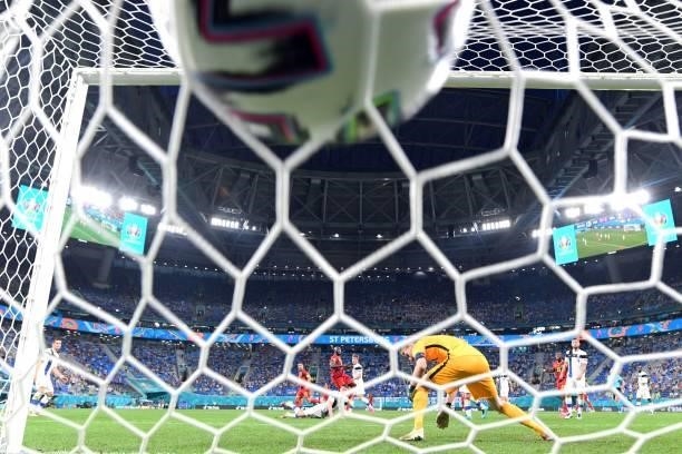 Belgium's forward Romelu Lukaku scores past Finland's goalkeeper Lucas Hradecky during the UEFA EURO 2020 Group B football match between Finland and...