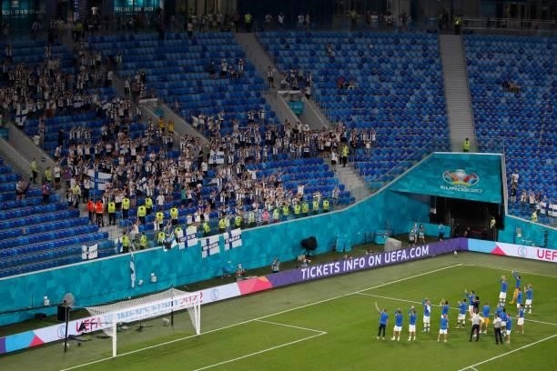 Finland's players greet their fans after the UEFA EURO 2020 Group B football match between Finland and Belgium at Saint Petersburg Stadium in Saint...