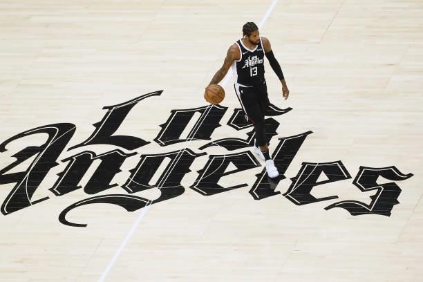 Paul George of the LA Clippers dribbles the ball against the Utah Jazz during Round 2, Game 6 of the 2021 NBA Playoffs on June 18, 2021 at STAPLES...