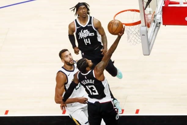 Paul George of the LA Clippers drives to the basket against the Utah Jazz during Round 2, Game 6 of the 2021 NBA Playoffs on June 18, 2021 at STAPLES...