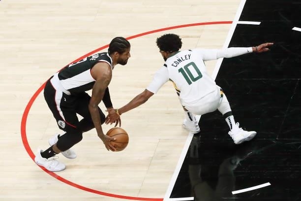 Paul George of the LA Clippers dribbles the ball against the Utah Jazz during Round 2, Game 6 of the 2021 NBA Playoffs on June 18, 2021 at STAPLES...