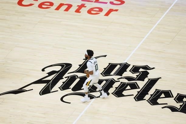 Mike Conley of the Utah Jazz dribbles the ball against the LA Clippers during Round 2, Game 6 of the 2021 NBA Playoffs on June 18, 2021 at STAPLES...
