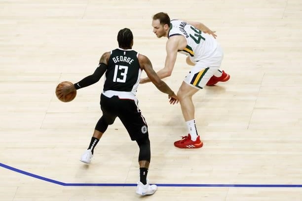 Bojan Bogdanovic of the Utah Jazz plays defense on Paul George of the LA Clippers during Round 2, Game 6 of the 2021 NBA Playoffs on June 18, 2021 at...