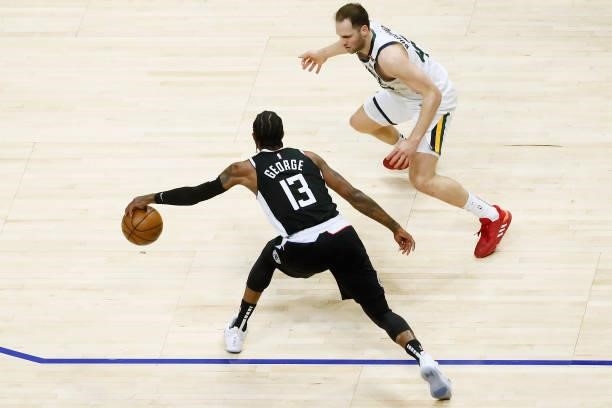 Bojan Bogdanovic of the Utah Jazz plays defense on Paul George of the LA Clippers during Round 2, Game 6 of the 2021 NBA Playoffs on June 18, 2021 at...