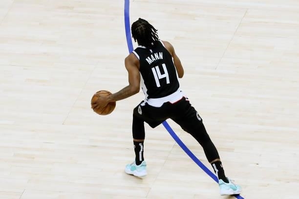 Terance Mann of the LA Clippers dribbles the ball against the Utah Jazz during Round 2, Game 6 of the 2021 NBA Playoffs on June 18, 2021 at STAPLES...