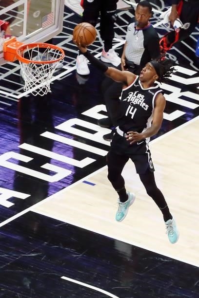 Terance Mann of the LA Clippers drives to the basket against the Utah Jazz during Round 2, Game 6 of the 2021 NBA Playoffs on June 18, 2021 at...