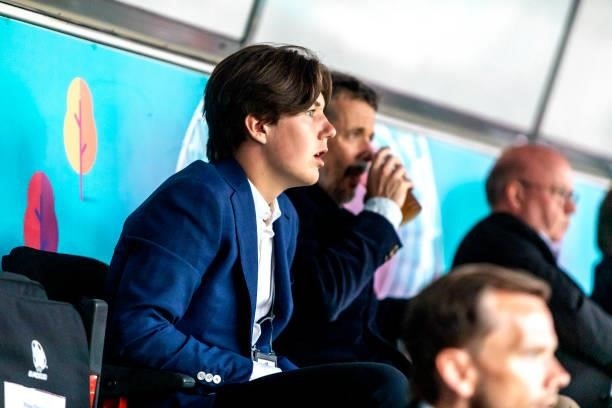 Danish Prince Christian is seen during a match between Denmark and Russia on June 21, 2021 in Copenhagen, Denmark. Next to the Prince is seen his...