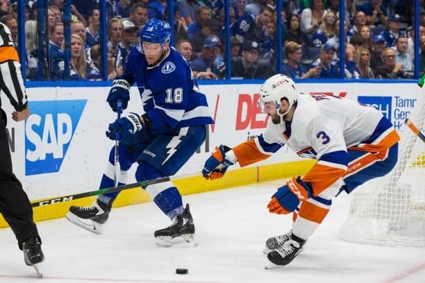 Ondrej Palat of the Tampa Bay Lightning skates against Adam Pelech of the New York Islanders during the third period in Game Five of the Stanley Cup...
