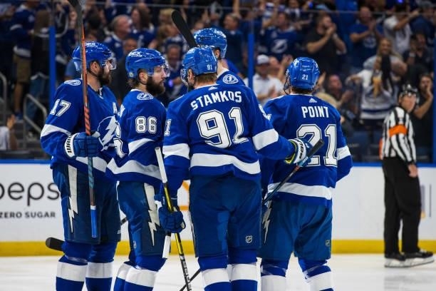 The Tampa Bay Lightning celebrate a goal by Brayden Point against the New York Islanders during the third period in Game Five of the Stanley Cup...