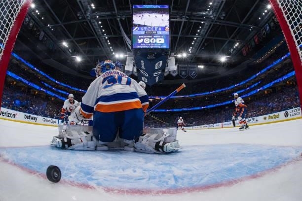 Goalie Ilya Sorokin of the New York Islanders gives up a goal against the Tampa Bay Lightning in Game Five of the Stanley Cup Semifinals of the 2021...