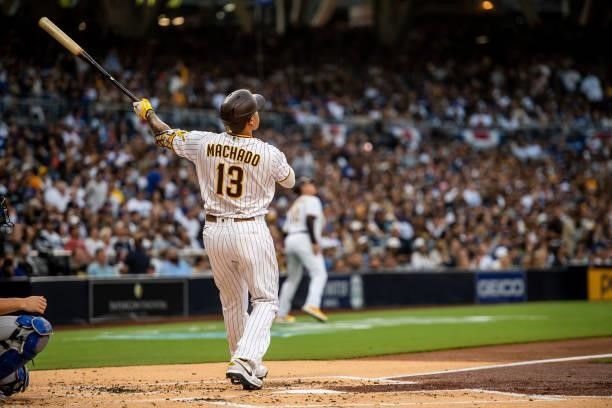 Manny Machado of the San Diego Padres hits a home run in the first inning against the Los Angeles Dodgers on June 21, 2021 at Petco Park in San...